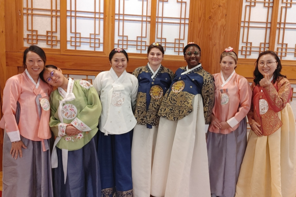 Mizzou Nursing students and instructor wear traditional dress