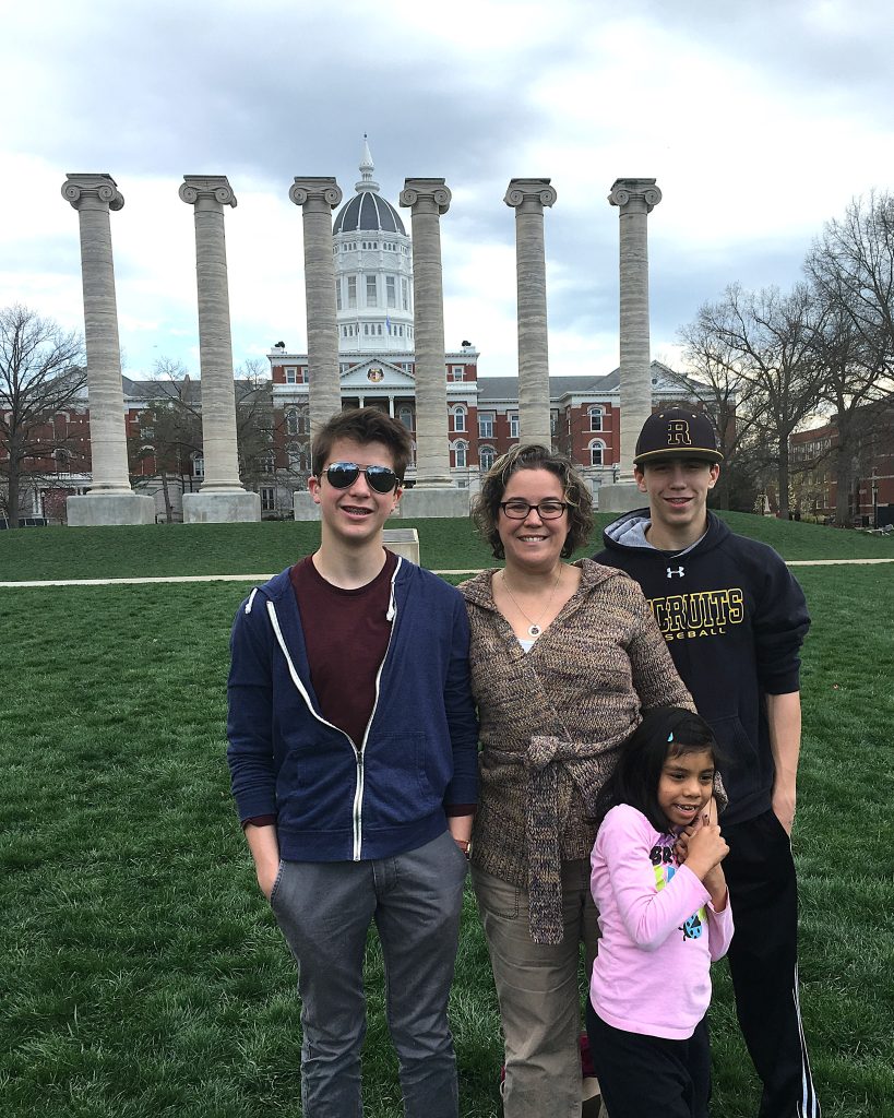 Michele with her three children in 2015 at Mizzou.